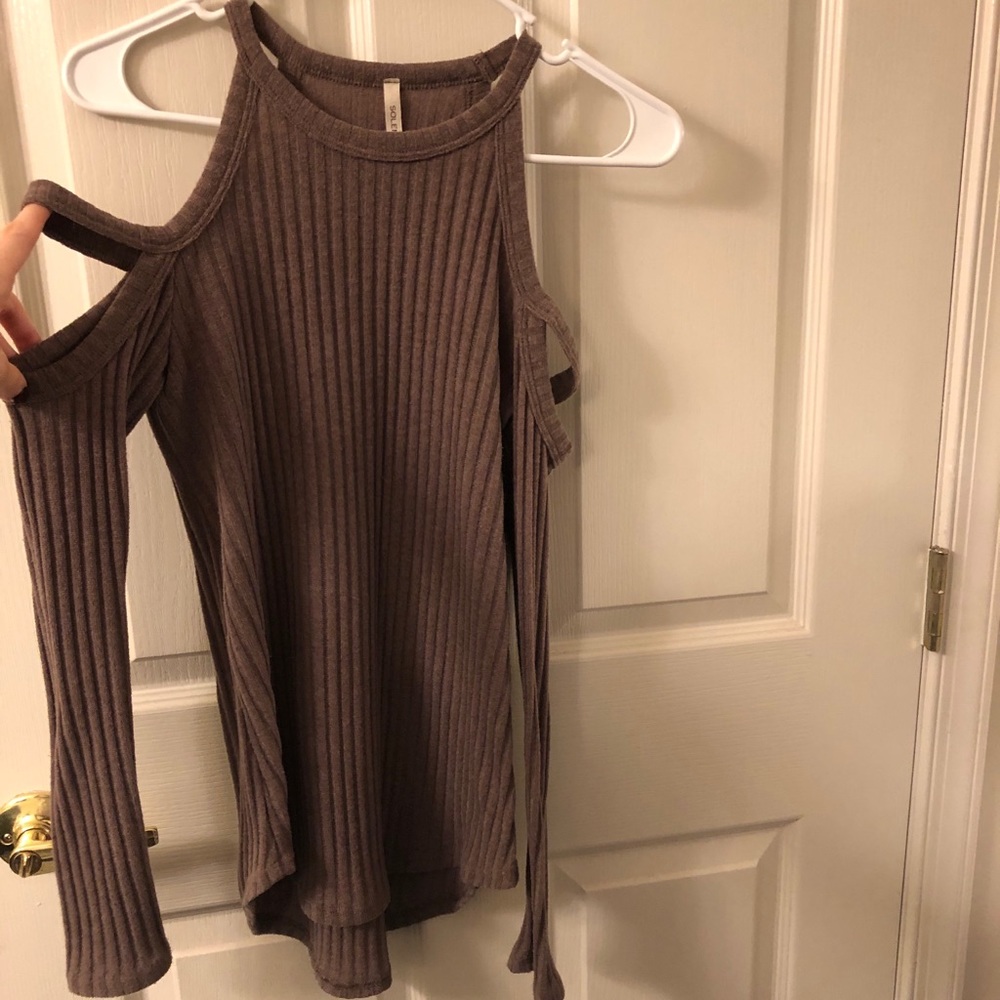 Sweater with shoulder cut out